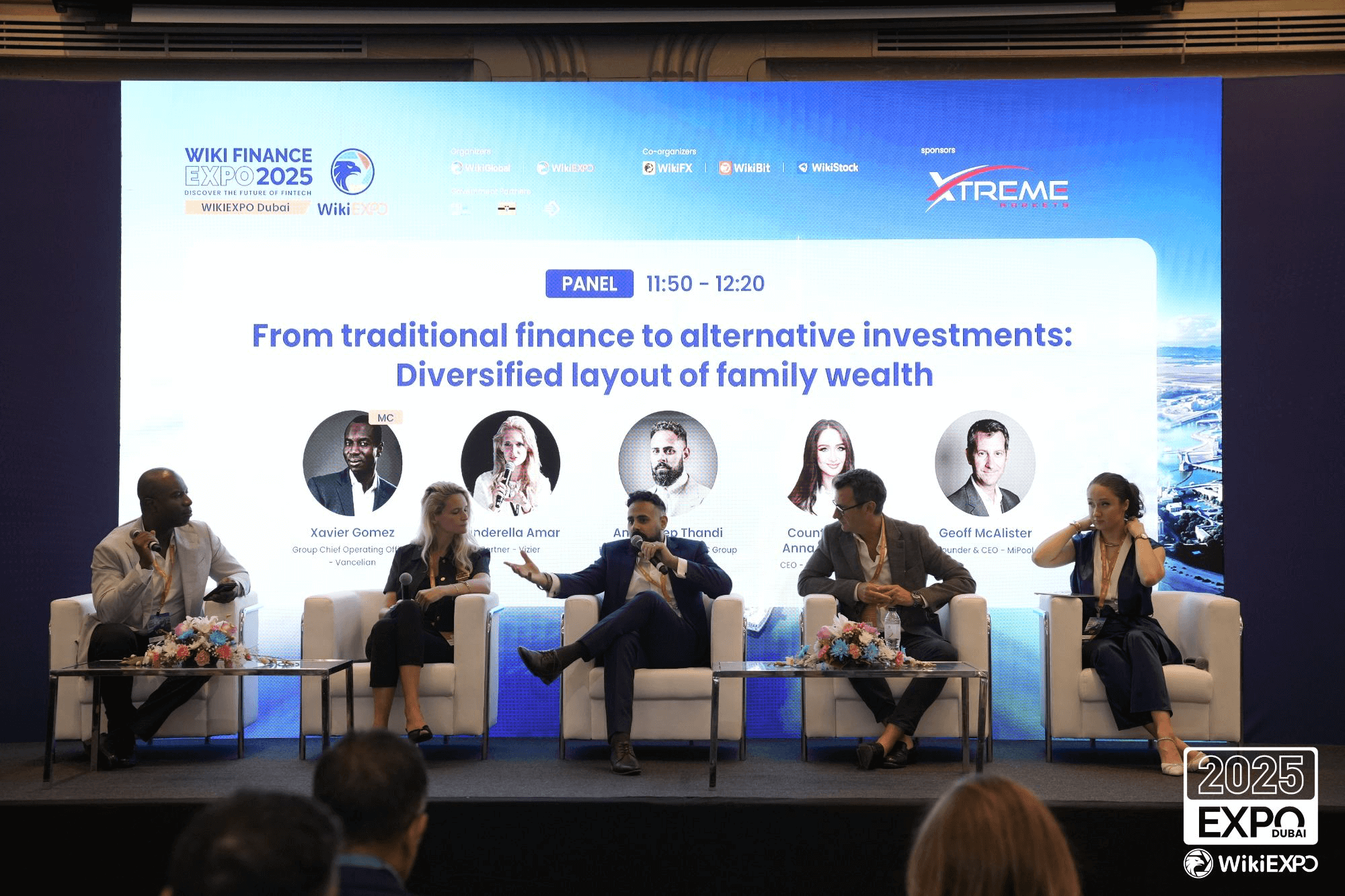 Four people discussing the theme of the exhibition